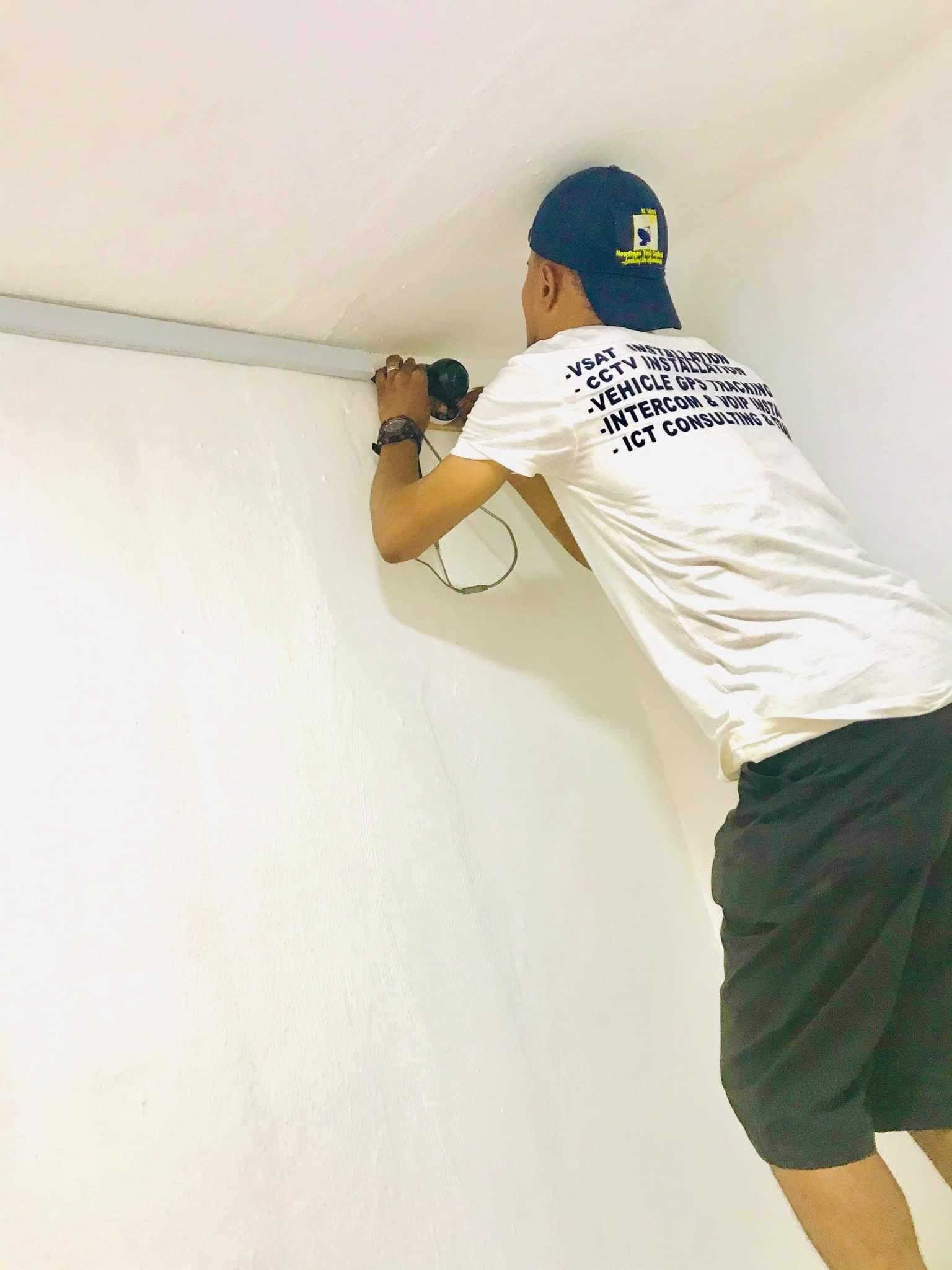 CCTV camera installation by technician